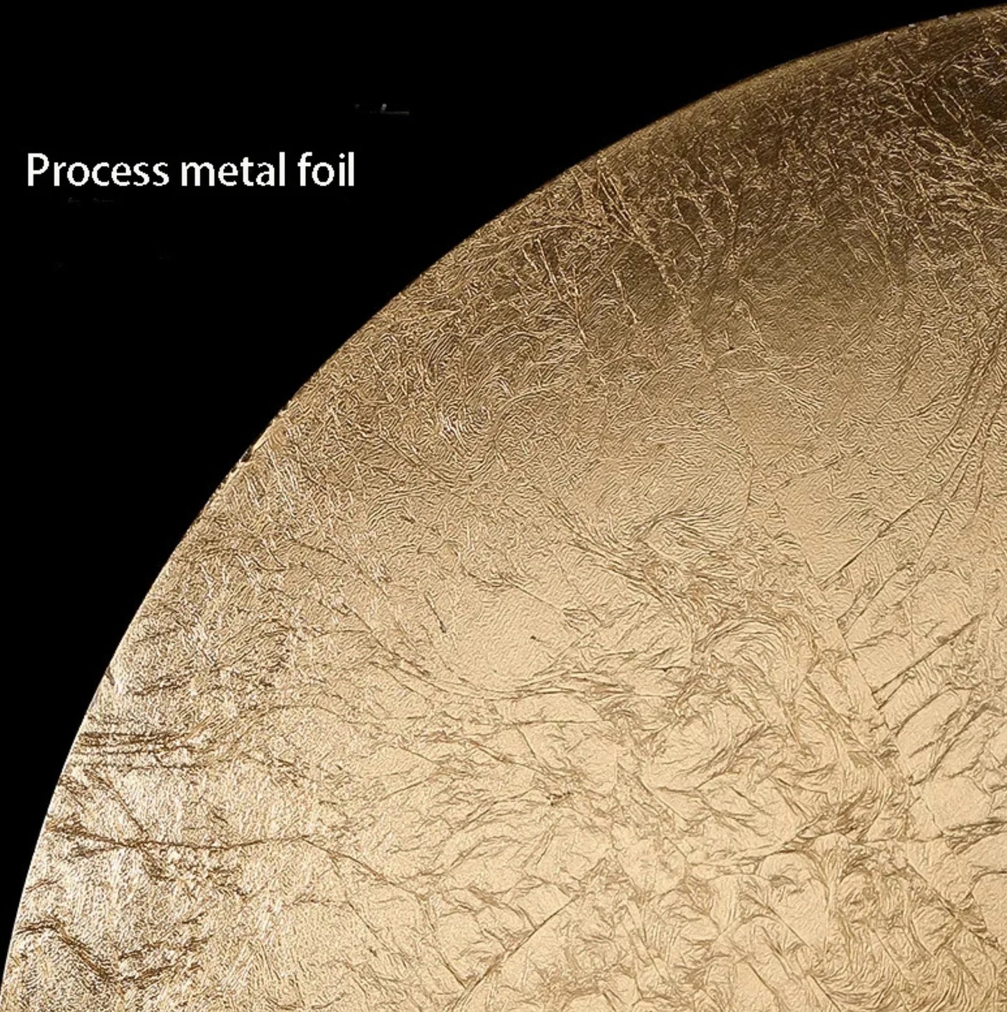 Close-up of process metal foil wall lamp with a textured surface on a black background
