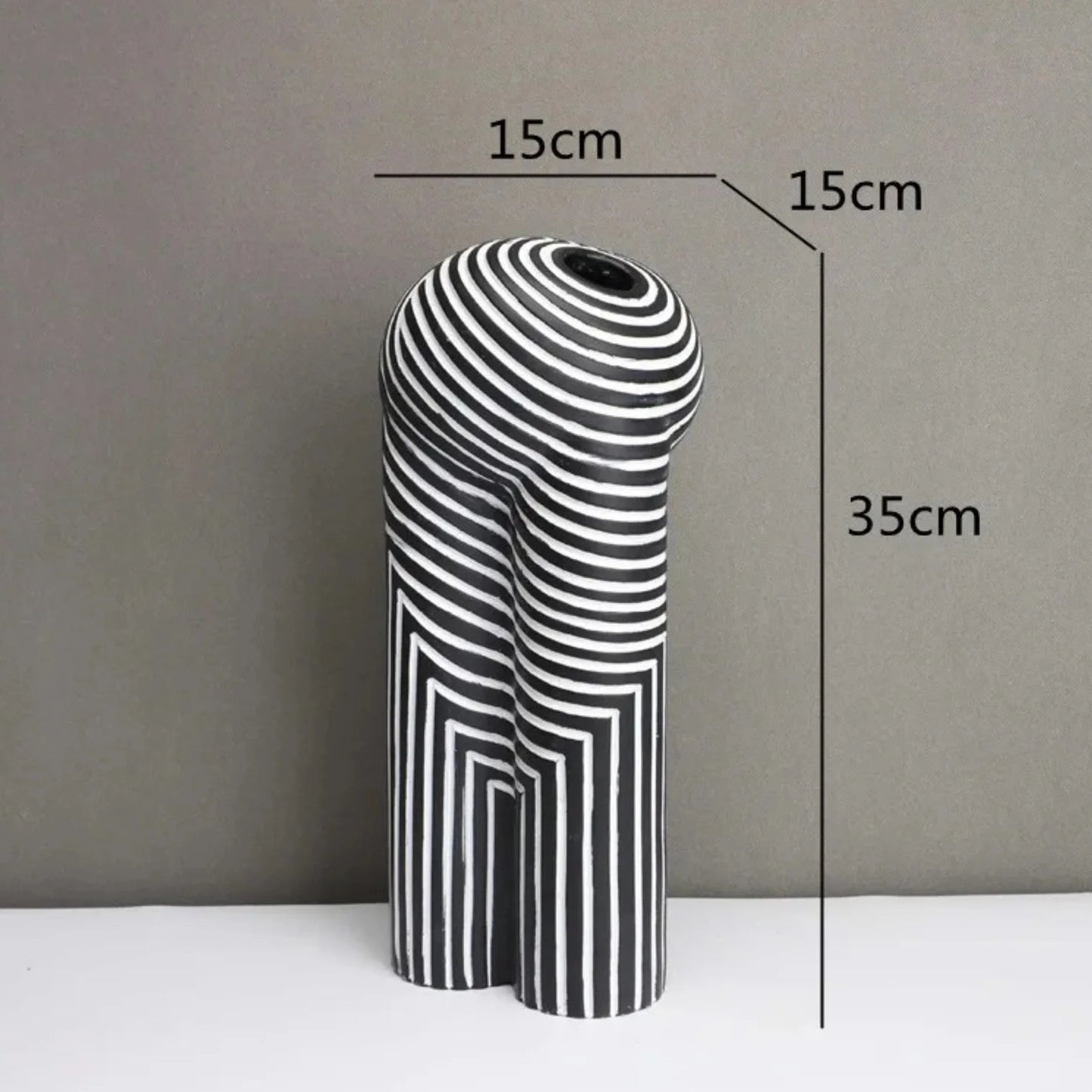 Striped black and white vase