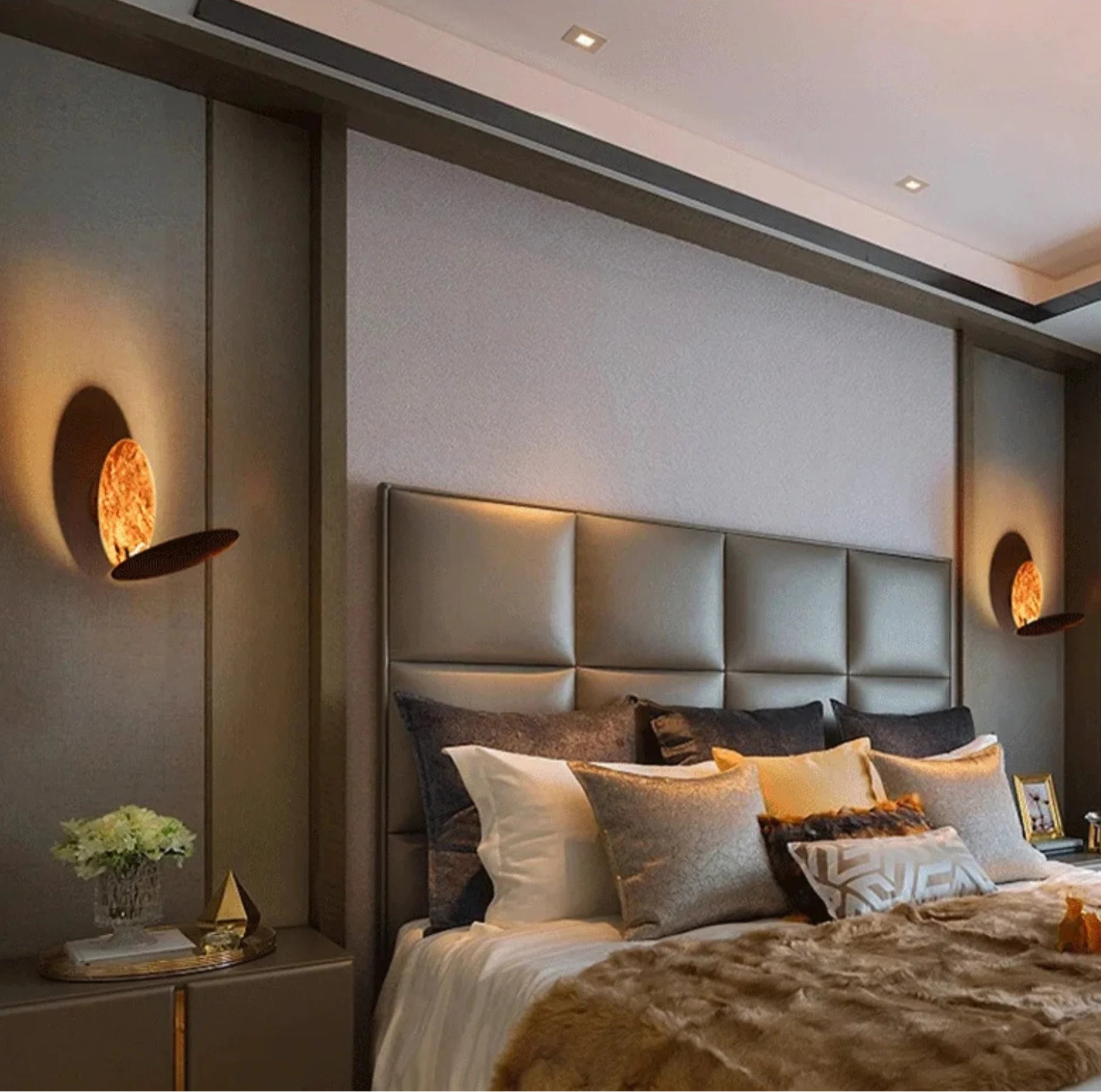 Modern bedroom with a bed, headboard, and wall light luna brass